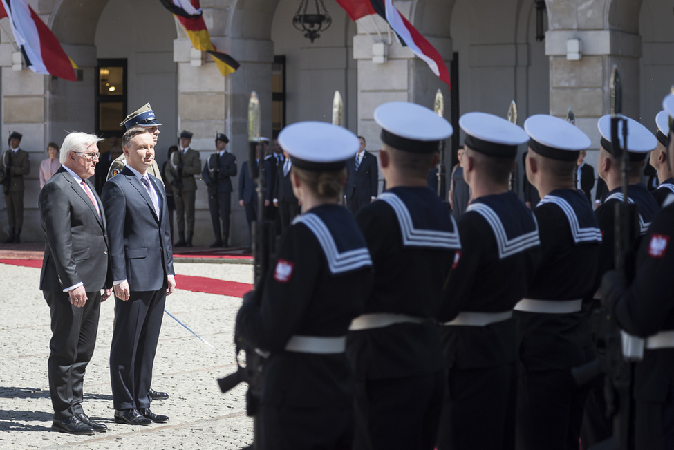 Federal President Frank-Walter Steinmeier is greeted with military honours by Polish President, Andrzej Duda, in Warsaw during his visit to the Republic of Poland