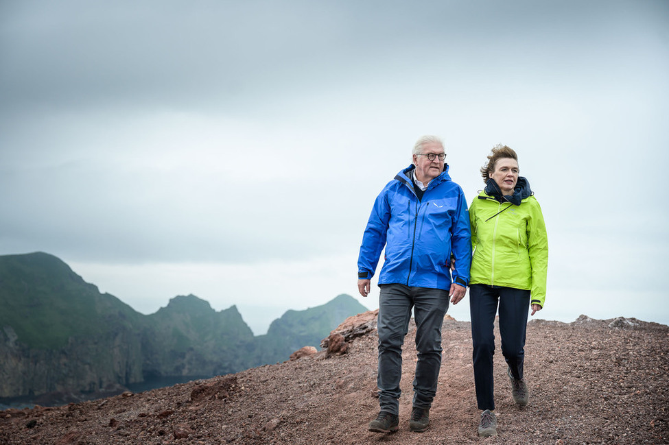Federal President Frank-Walter Steinmeier and Elke Büdenbender are walking on the Eldfell volcano during their state visit to Iceland